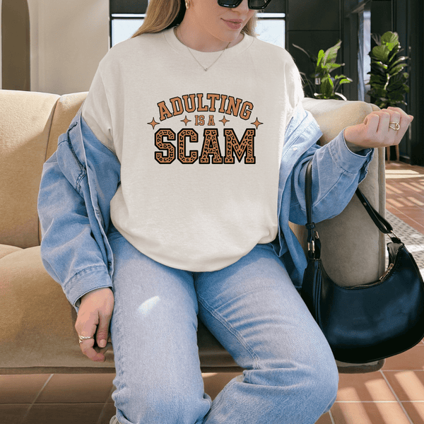 Adulting Is a Scam Funny Graphic Tee for Everyday Sarcasm Lovers